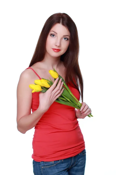 Happy girl with yellow tulips — Stock Photo, Image