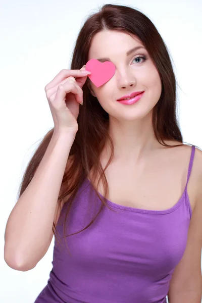 Girl with symbol of heart — Stock Photo, Image