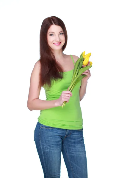 Happy girl with yellow tulips — Stock Photo, Image