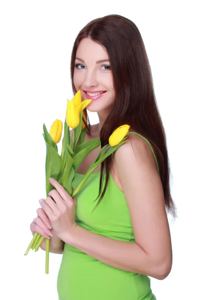 Happy girl with yellow tulips — Stock Photo, Image