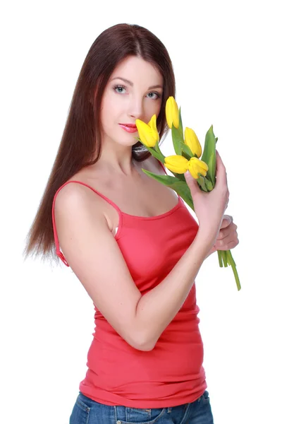 Chica feliz con tulipanes amarillos — Foto de Stock