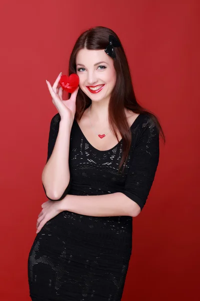 Woman holding a present — Stock Photo, Image