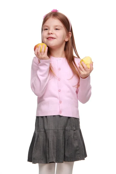 Schöne Schulmädchen mit Apfel — Stockfoto