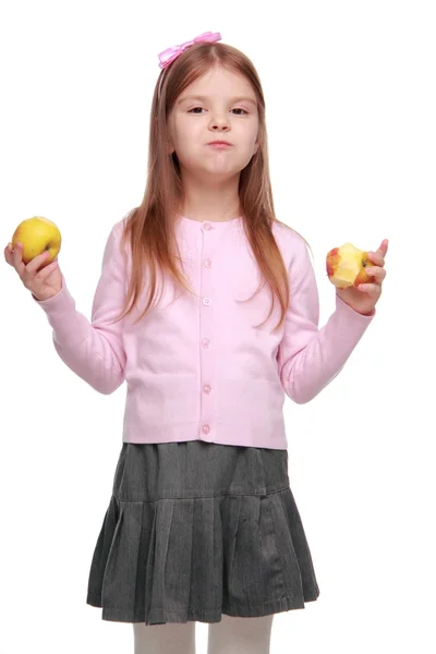 Preciosa chica de la escuela con manzana — Foto de Stock