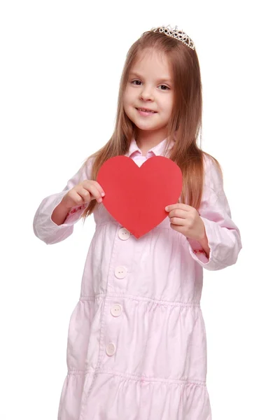 Little girl with a heart — Stock Photo, Image