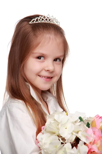 Little girl with a bouquet — Stock Photo, Image