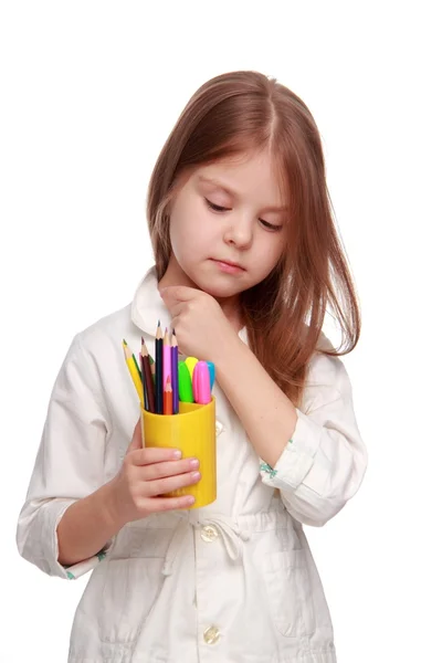 Little schoolgirl with pencils — Stock Photo, Image