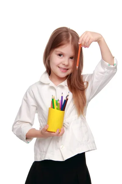 Petite écolière avec crayons — Photo