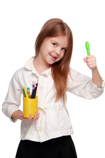 Little schoolgirl with pencils — Stock Photo, Image