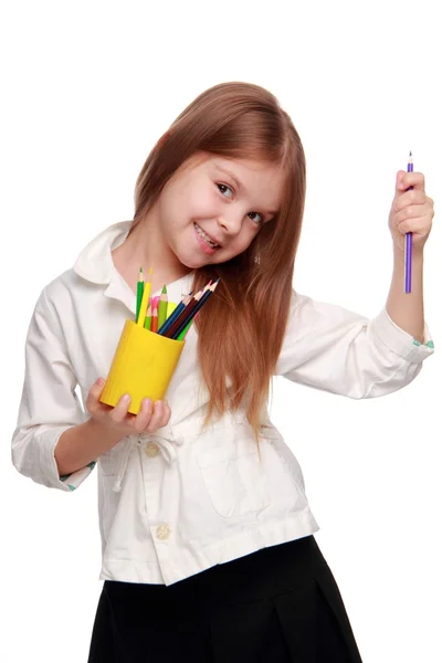 Weinig schoolmeisje met potloden — Stockfoto