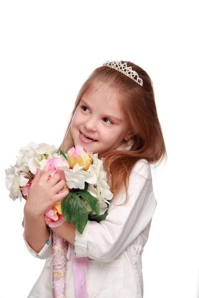 Little girl with a bouquet — Stock Photo, Image