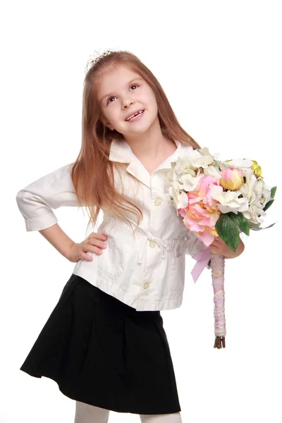 Little girl with a bouquet — Stock Photo, Image