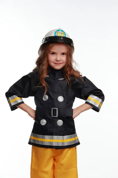 Happy girl firefighter — Stock Photo, Image