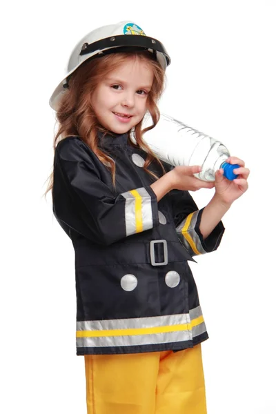 Szczęśliwa dziewczyna strażak — Zdjęcie stockowe