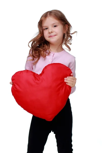 Mooi klein meisje met een hart — Stockfoto