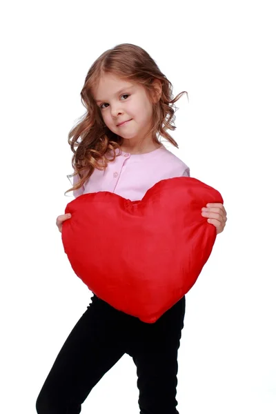 Bella bambina con un cuore — Foto Stock