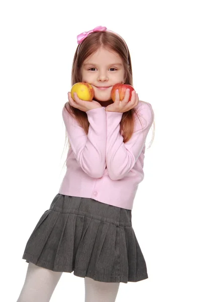 Flicka med äpplen — Stockfoto
