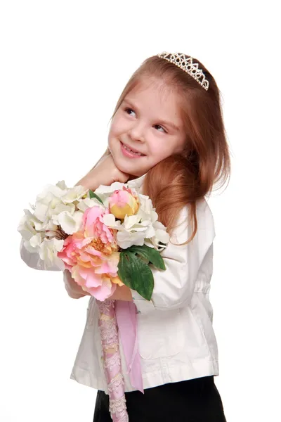 Schoolgirl met een boeket — Stockfoto