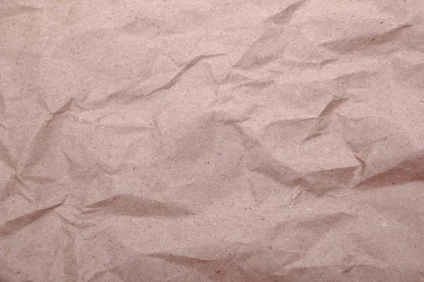 Crumpled white paper as a background — Stock Photo, Image
