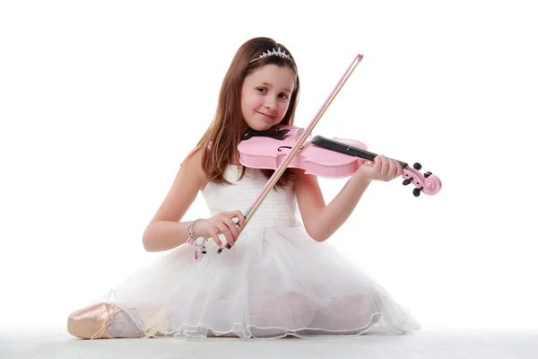 Ballerina i pointe, spiller violin - Stock-foto