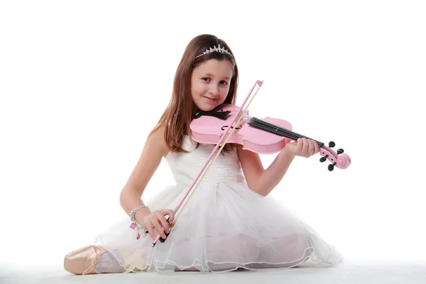 Ballerina i pointe, spiller violin - Stock-foto