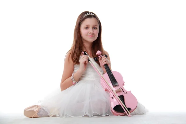 Ung ballerina med en violin - Stock-foto