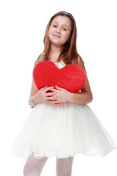 A little girl in a white dress — Stock Photo, Image