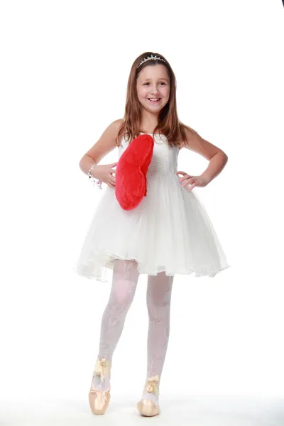 A little girl in a white dress — Stock Photo, Image