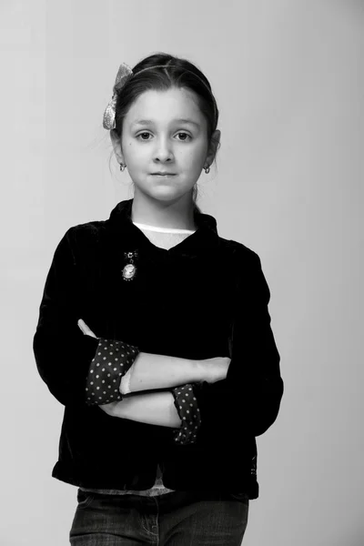 Black and white close-up portrait of smiling pretty little girl — Stock Photo, Image