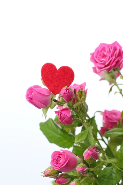 Símbolo de coração romântico e flores em Valentim feliz — Fotografia de Stock