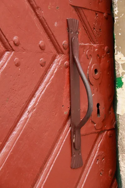 Handle on an old door — Stock Photo, Image