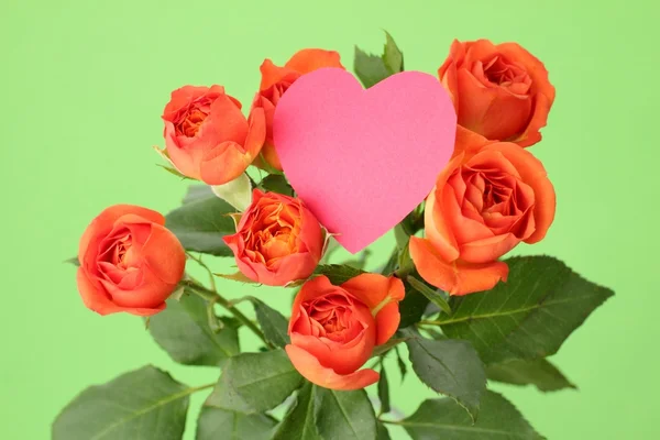 Image of blossom roses with heart symbol Stock Image