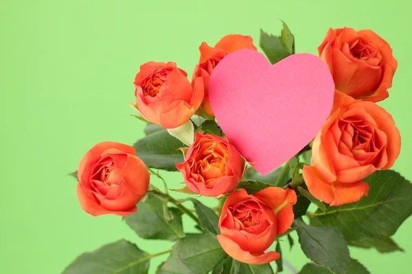 Image of blossom roses with heart symbol Stock Image