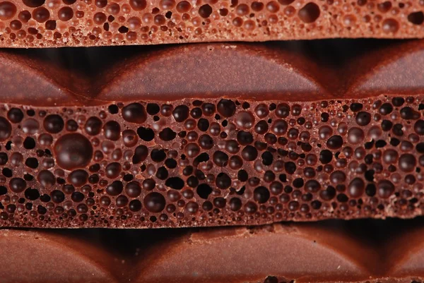 Foto oxidem uhličitým hnědé a černé čokolády — Stock fotografie