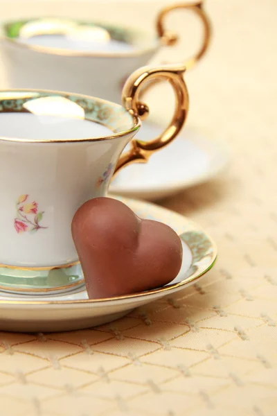 Copo de café clássico e doces de chocolate — Fotografia de Stock