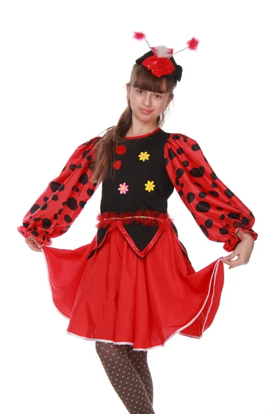 Happy young girl in a beautiful fancy dress ladybird on white background — Stock Photo, Image