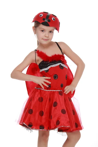 Cheerful little girl dressed in red costume with wings Ladybug — Stock Photo, Image