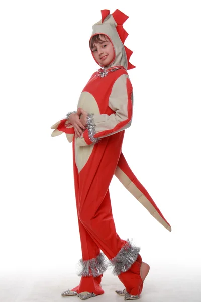 Nice little girl in a cheerful red suit dragon on Holiday — Stock Photo, Image