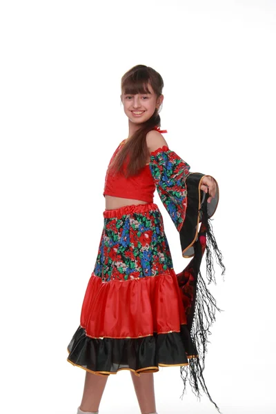 Charmante junge Mädchen in einem hellen Zigeunerkleid — Stockfoto