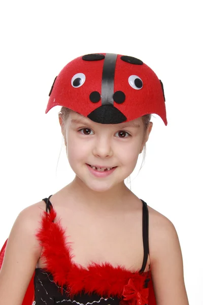 날개 무당벌레와 함께 붉은 의상을 입고 명랑 소녀 — 스톡 사진