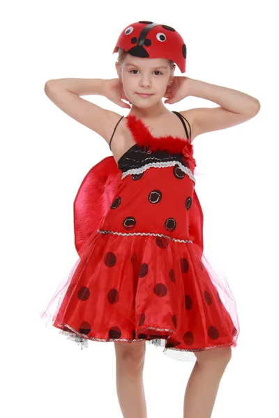 Cheerful little girl dressed in red costume with wings Ladybug — Stock Photo, Image