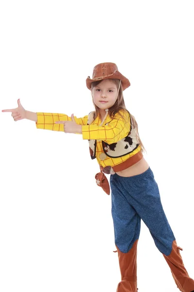 Menina bonita em um traje de cowboy no fundo branco — Fotografia de Stock