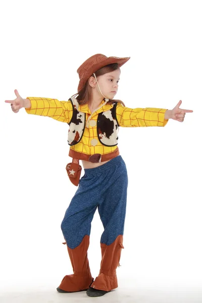 Beautiful little girl in a cowboy costume on white background — Stock Photo, Image