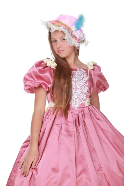 Menina em um chapéu lindo e vestido rosa exuberante — Fotografia de Stock