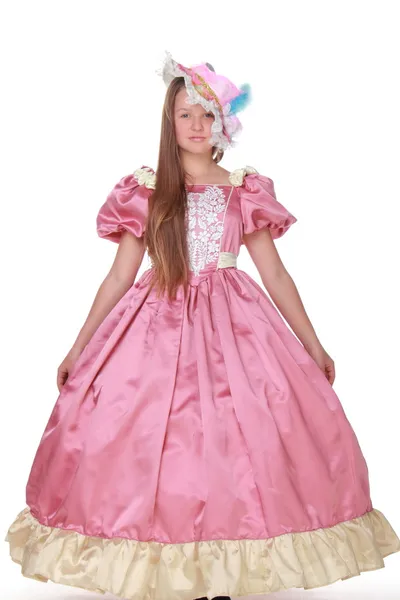 Dívka v krásný klobouk a svěží růžové šaty — Stock fotografie