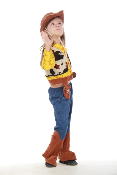 Schönes kleines Mädchen im Cowboy-Kostüm auf weißem Hintergrund — Stockfoto