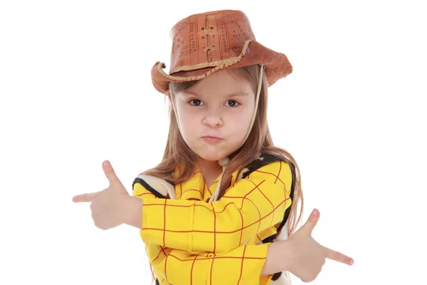 Hermosa niña en un disfraz de vaquero sobre fondo blanco —  Fotos de Stock