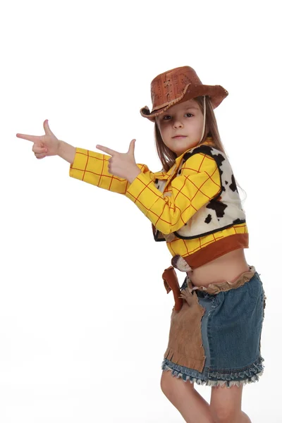 Güzel küçük bir kız kovboy kostümlü beyaz zemin üzerine — Stok fotoğraf
