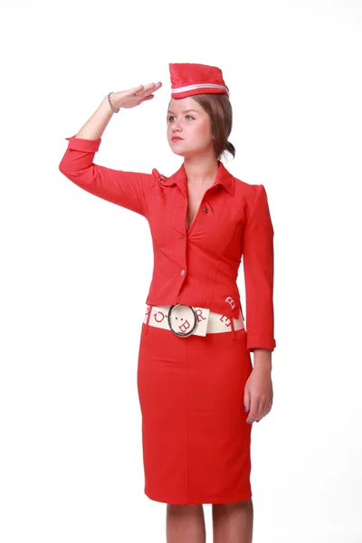 A nice young woman in a red suit on white background — Stock Photo, Image