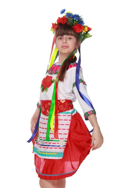 Girl in flowers wreath and traditional clothes — Stock Photo, Image